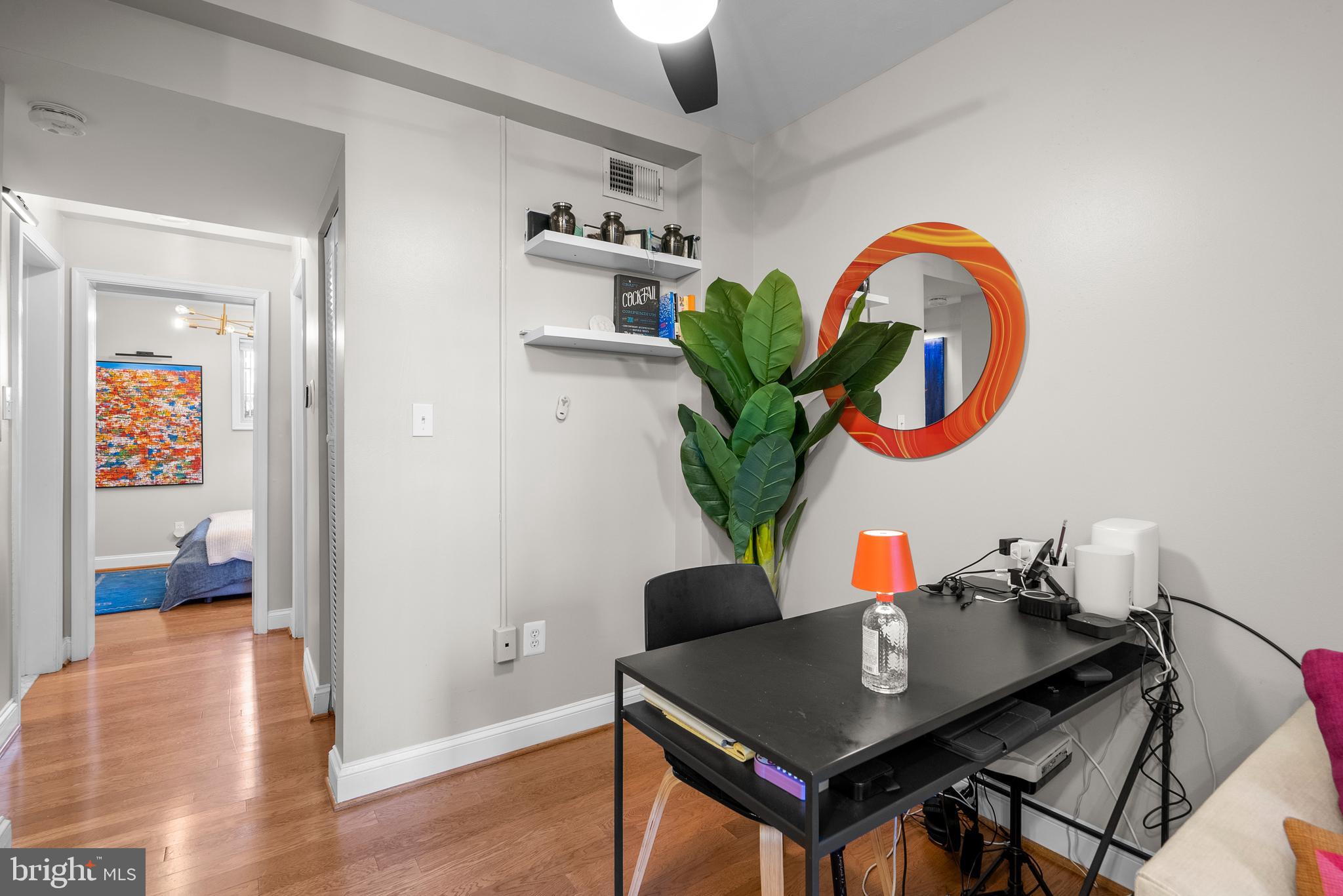 718 Park Road Northwest, Unit 1 Washington, DC 20010 - Photo 10 of 28 a living room with furniture and a potted plant