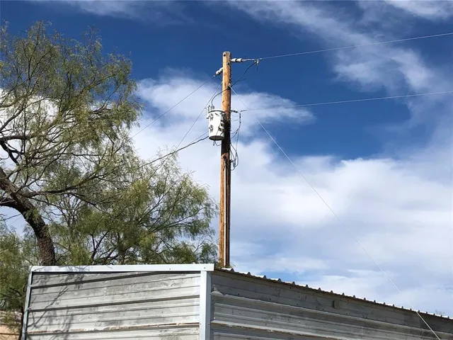a view of a street with a building in background