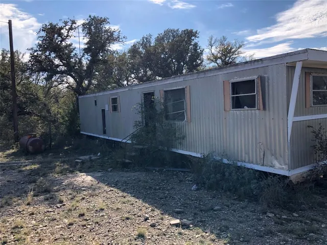 a view of lake with green space