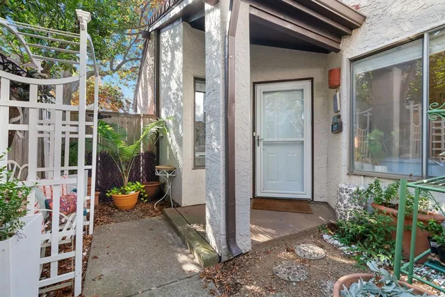 a front view of a house with a porch