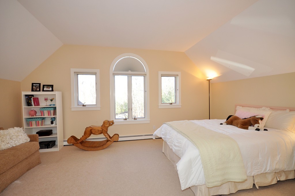 170 Sandy Pond Road Lincoln, MA 01773 - Photo 14 of 18 a bedroom with bed and a large window