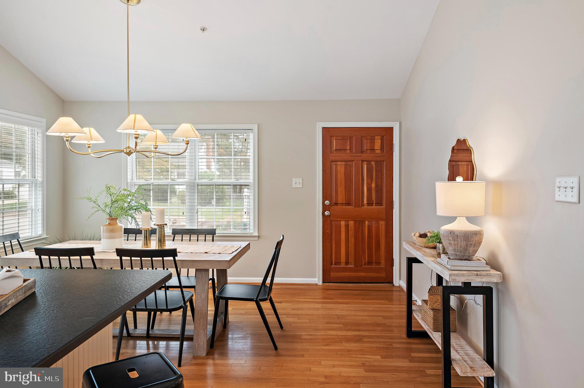 129 Gibson Road Annapolis, MD 21401 - Photo 13 of 50 a view of a dining room with furniture window and wooden floor