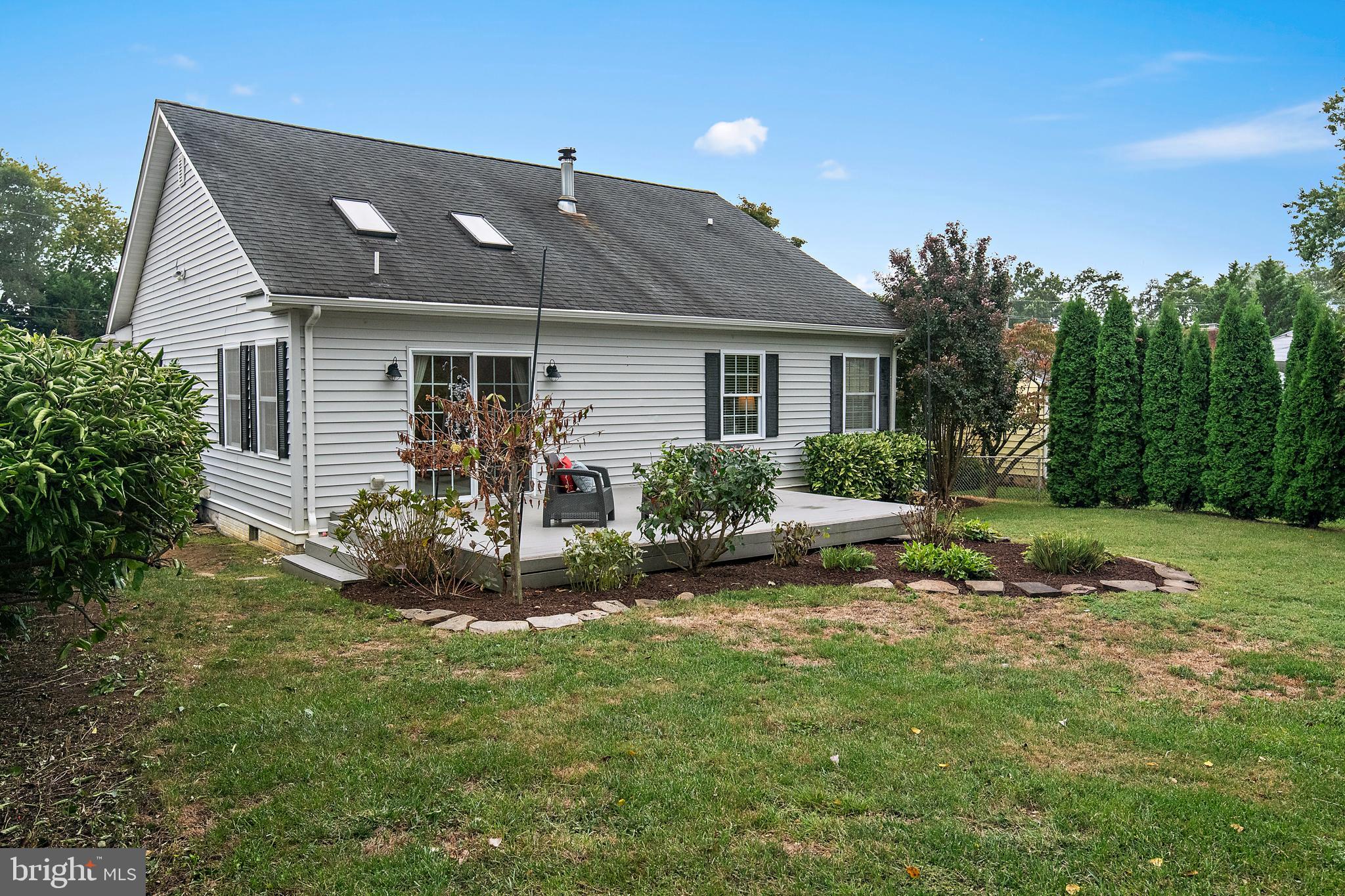 129 Gibson Road Annapolis, MD 21401 - Photo 2 of 50 a view of a house with a yard and plants