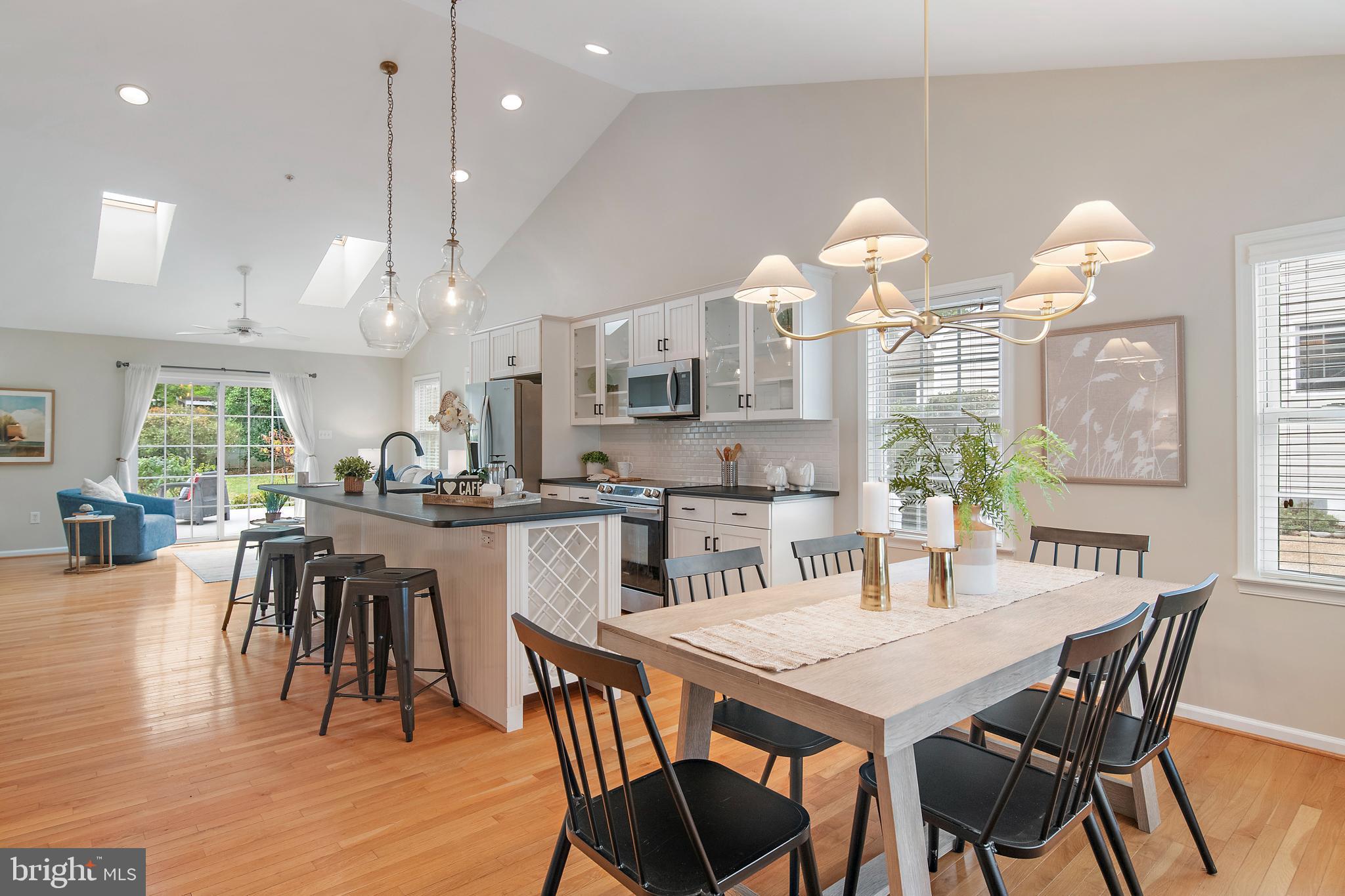 129 Gibson Road Annapolis, MD 21401 - Photo 4 of 50 a view of a dining room with furniture window and wooden floor