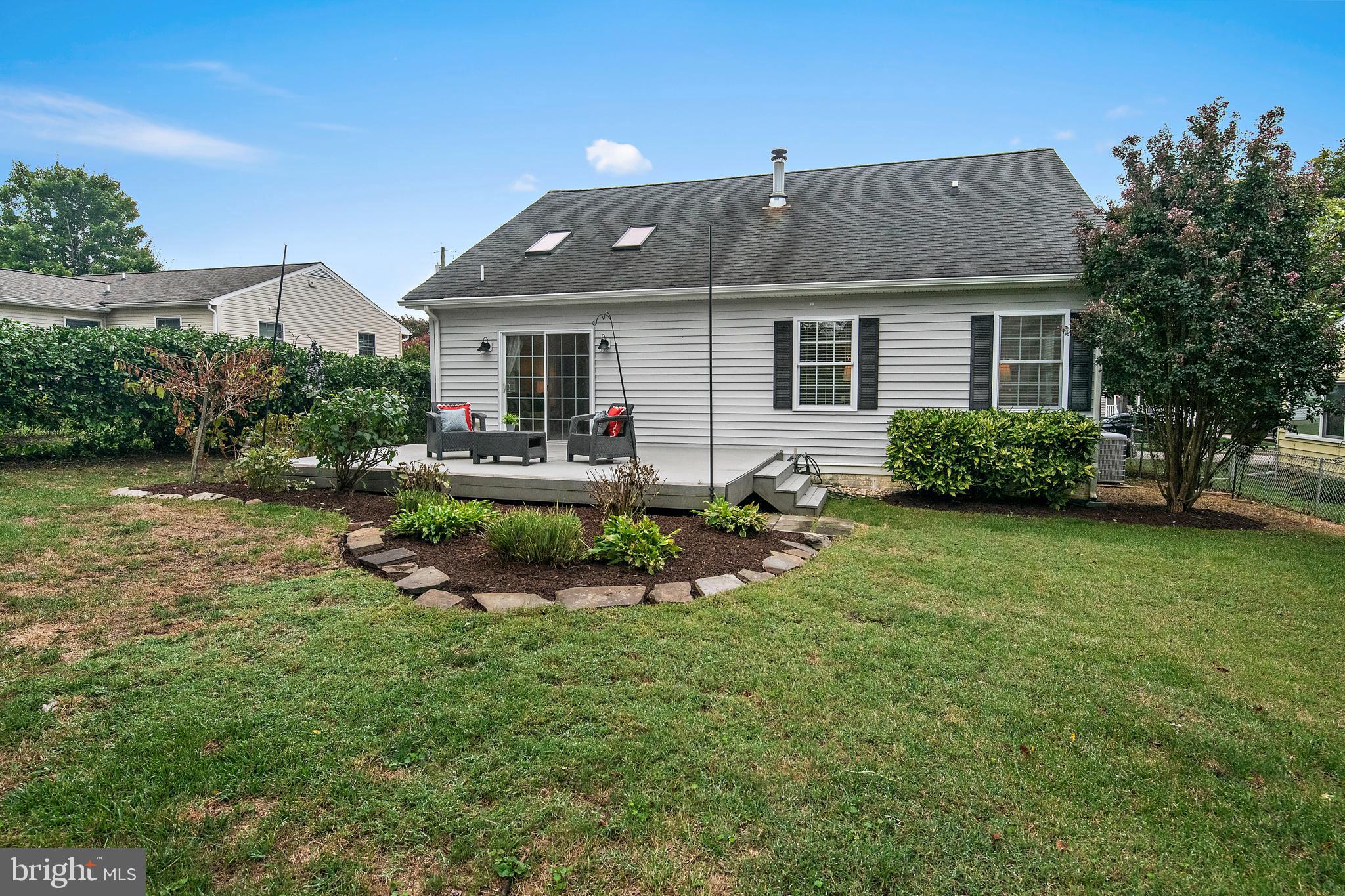 129 Gibson Road Annapolis, MD 21401 - Photo 41 of 50 a front view of house with a garden and swimming pool