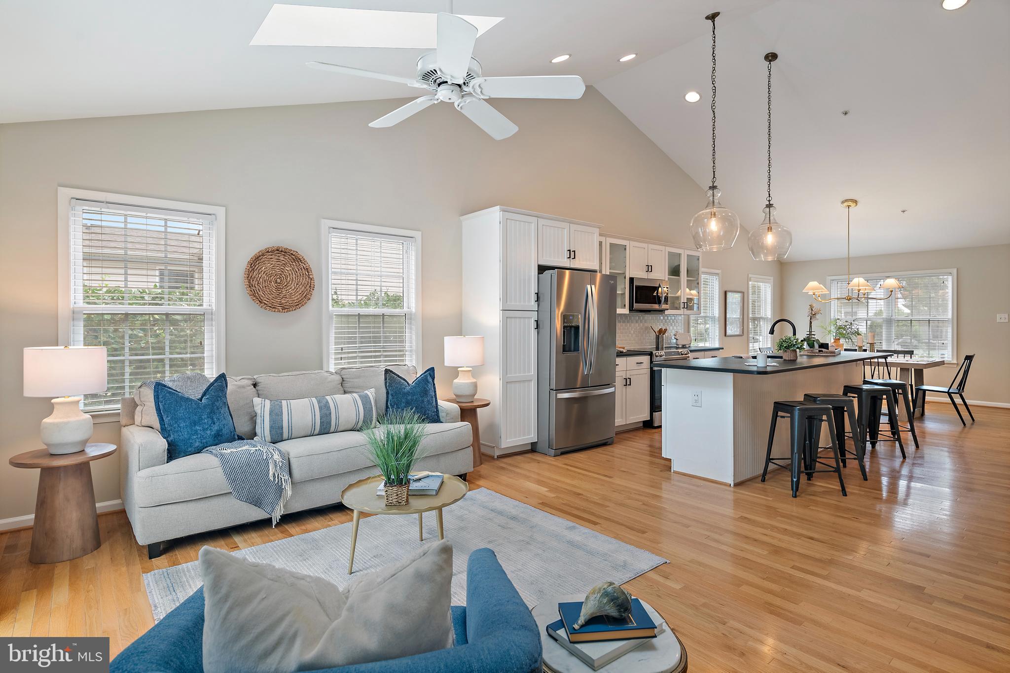 129 Gibson Road Annapolis, MD 21401 - Photo 6 of 50 a living room with furniture kitchen view and a chandelier