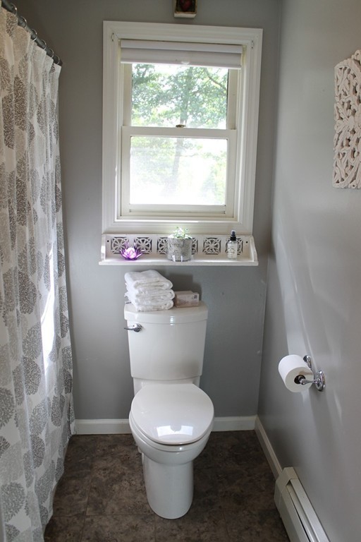 109 Fisherdick Road Ware, MA 01082 - Photo 12 of 27 a bathroom with a toilet and a shower