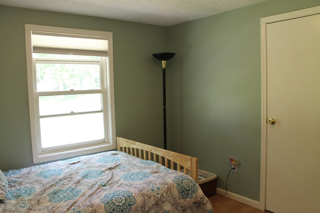 109 Fisherdick Road Ware, MA 01082 - Photo 20 of 27 a bedroom with a bed and a window