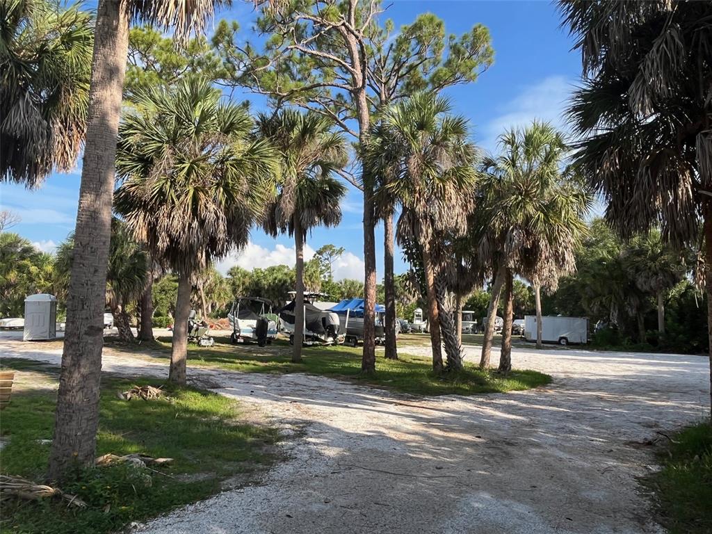 23465 Harbor View Road, Unit 1006 Punta Gorda, FL 33980 - Photo 39 of 41 a view of road with yard