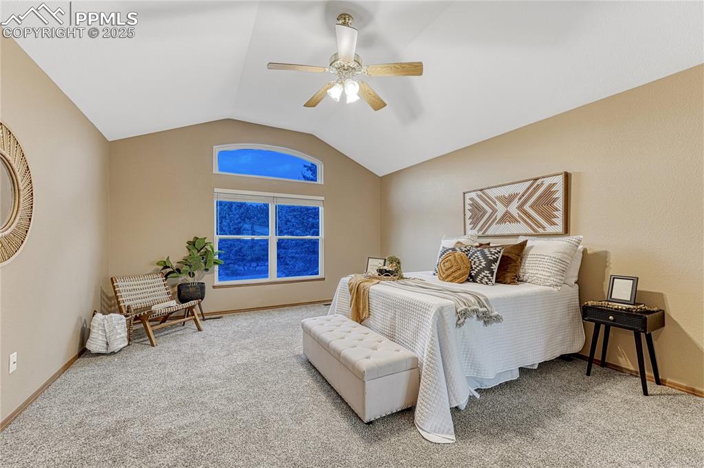 5514 Saxon Lane Colorado Springs, CO 80918 - Photo 23 of 50 a living room with furniture and a large window