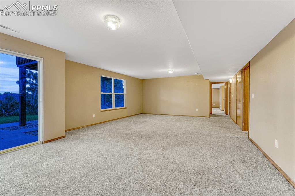 5514 Saxon Lane Colorado Springs, CO 80918 - Photo 35 of 50 a view of an empty room with a window