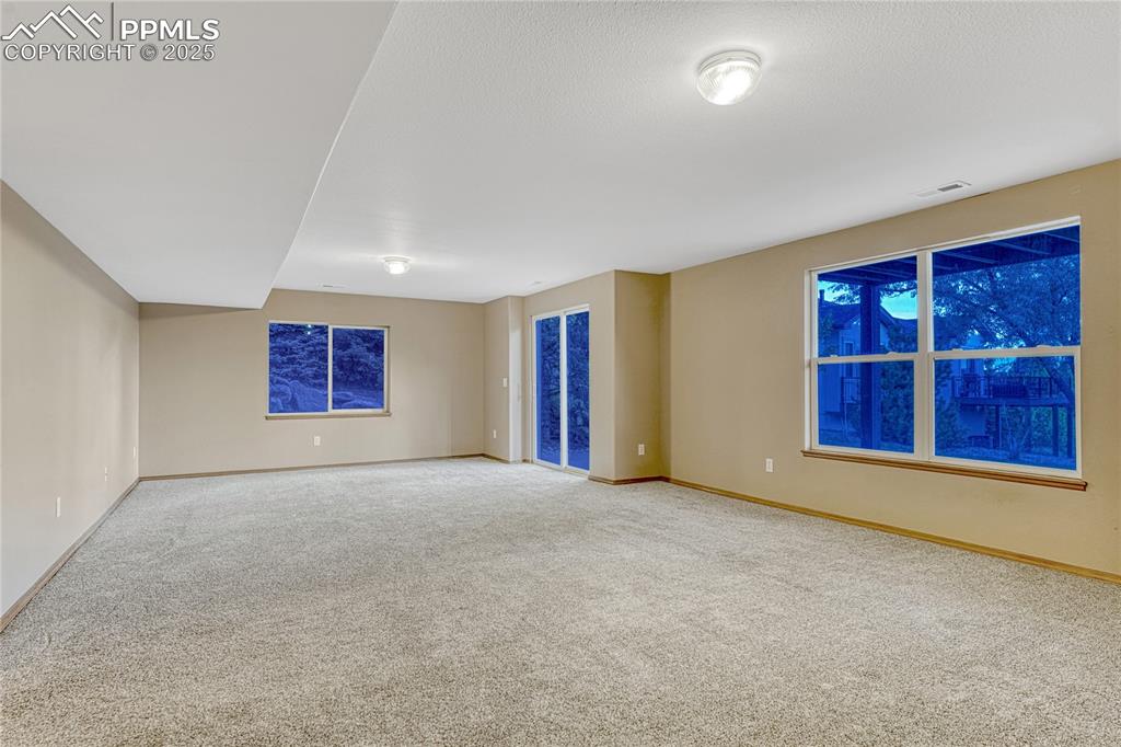 5514 Saxon Lane Colorado Springs, CO 80918 - Photo 36 of 50 an empty room with furniture and window