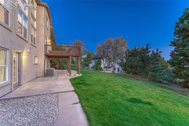 a view of a backyard with garden