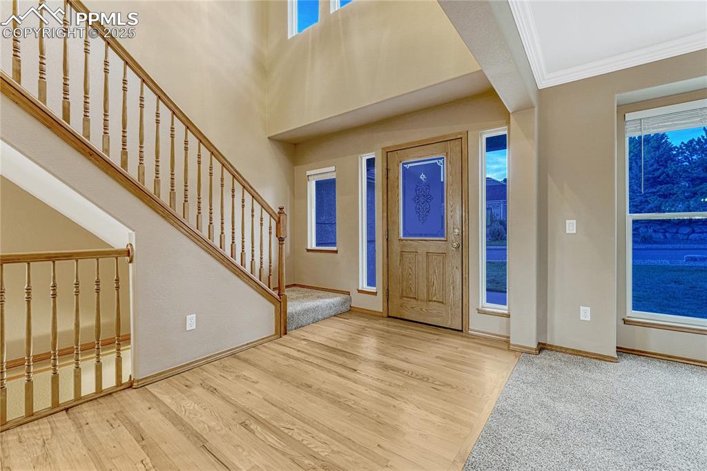 5514 Saxon Lane Colorado Springs, CO 80918 - Photo 10 of 50 a view of an entryway with wooden floor and door