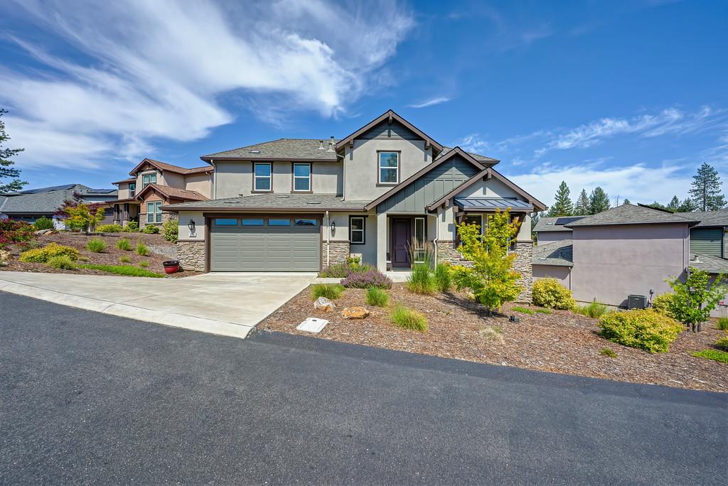 504 Chase Court Colfax, CA 95713 - Photo 15 of 94 a front view of a house with a yard and garage