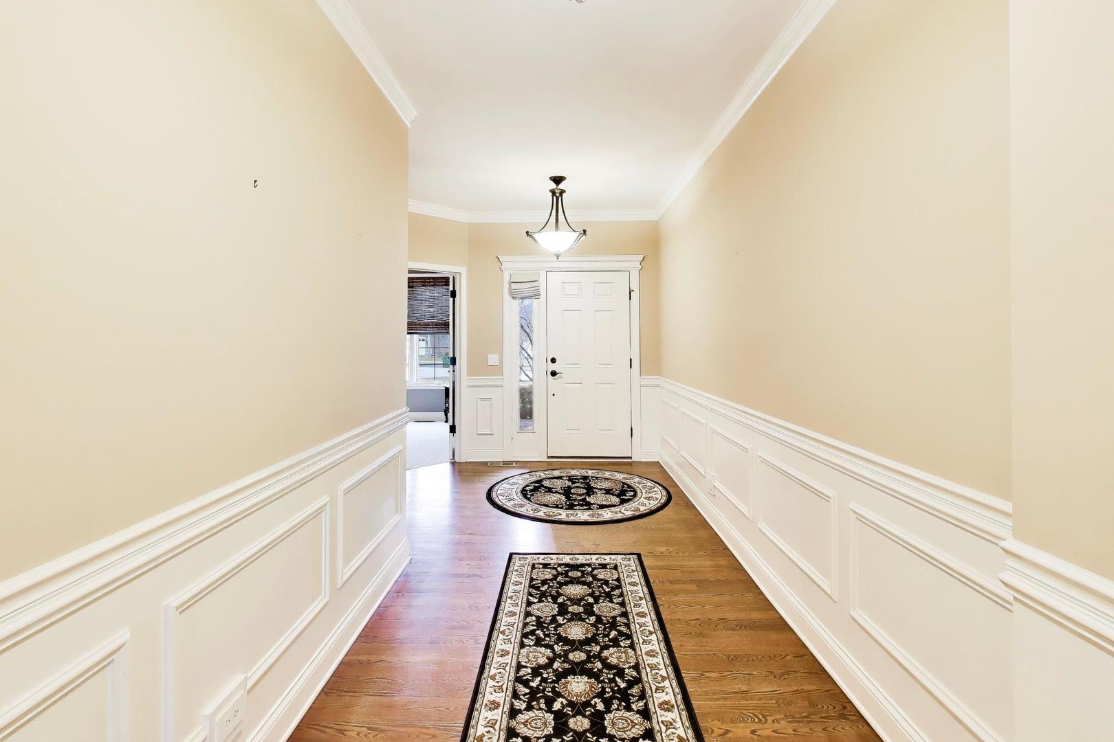 1N598 Golf View Lane Winfield, IL 60190 - Photo 2 of 33 a view of entryway with wooden floor