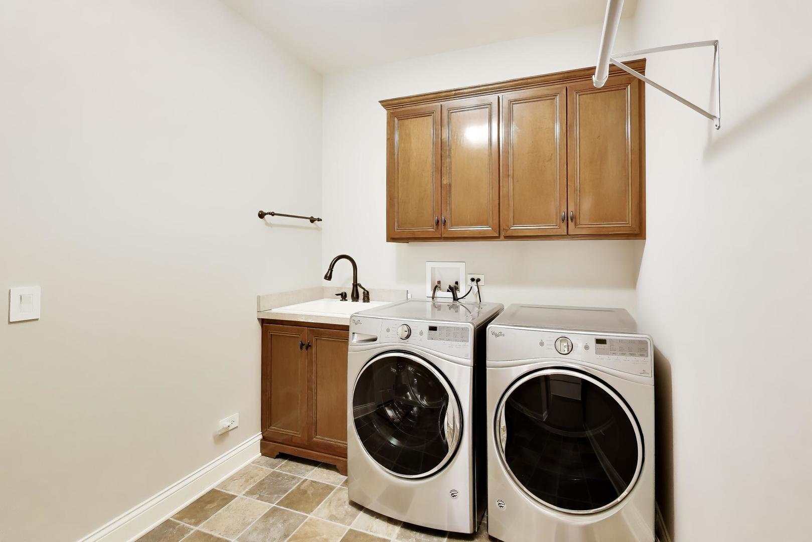 1N598 Golf View Lane Winfield, IL 60190 - Photo 24 of 33 a utility room with dryer and washer