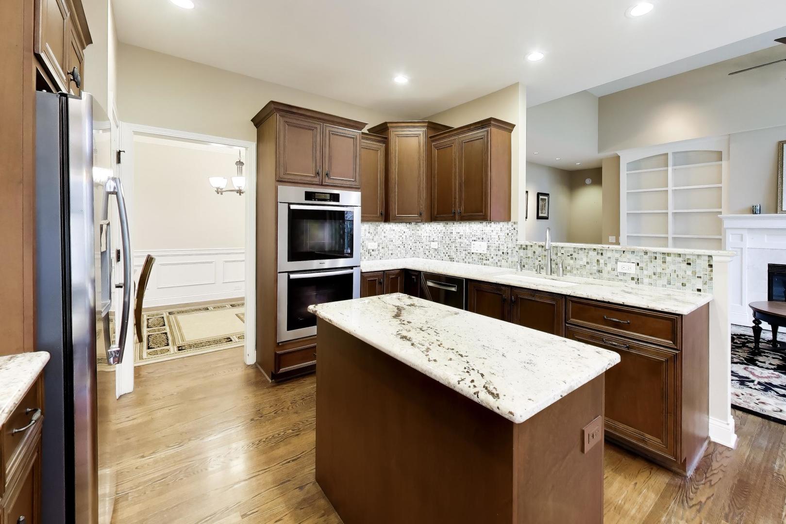 1N598 Golf View Lane Winfield, IL 60190 - Photo 9 of 33 a kitchen with a refrigerator a sink and a oven