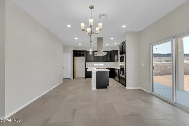 a view of a kitchen with a sink and dishwasher