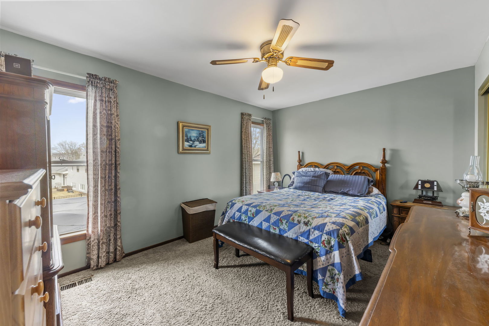 580 Whitehall Way Bolingbrook, IL 60440 - Photo 14 of 25 a bedroom with a bed and a chandelier