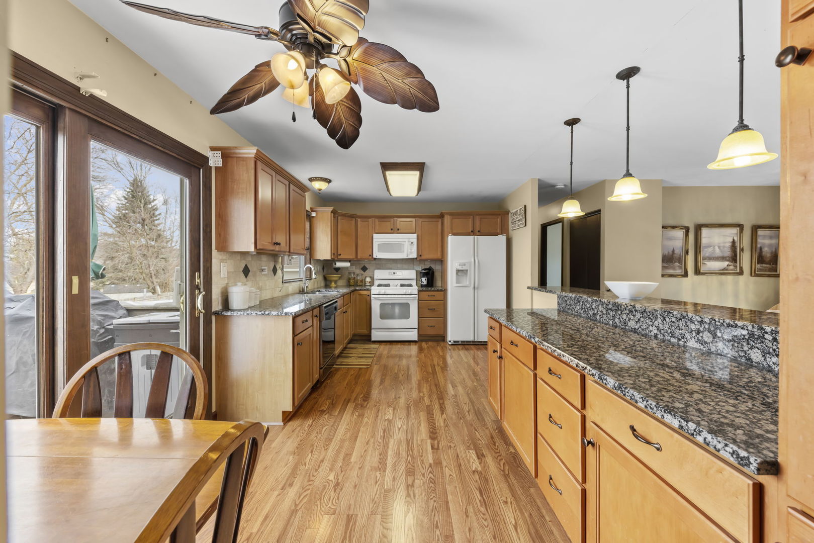 580 Whitehall Way Bolingbrook, IL 60440 - Photo 7 of 25 a open kitchen with stainless steel appliances granite countertop a stove and refrigerator
