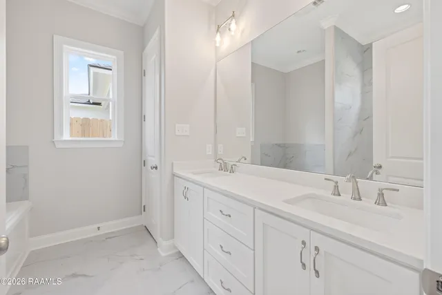 $300,000 | 242 Jagged Grove Lane, Youngsville, LA 70592