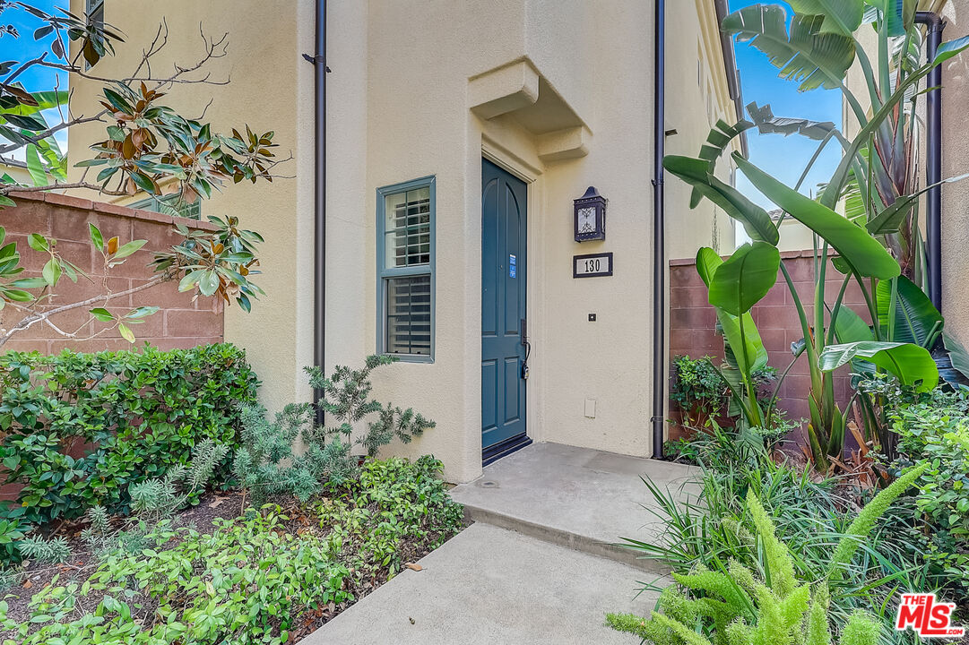 130 Firefly Irvine, CA 92618 - Photo 1 of 29 front view of a house with potted plants
