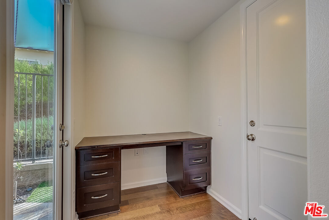 130 Firefly Irvine, CA 92618 - Photo 13 of 29 a room with a dresser and a window