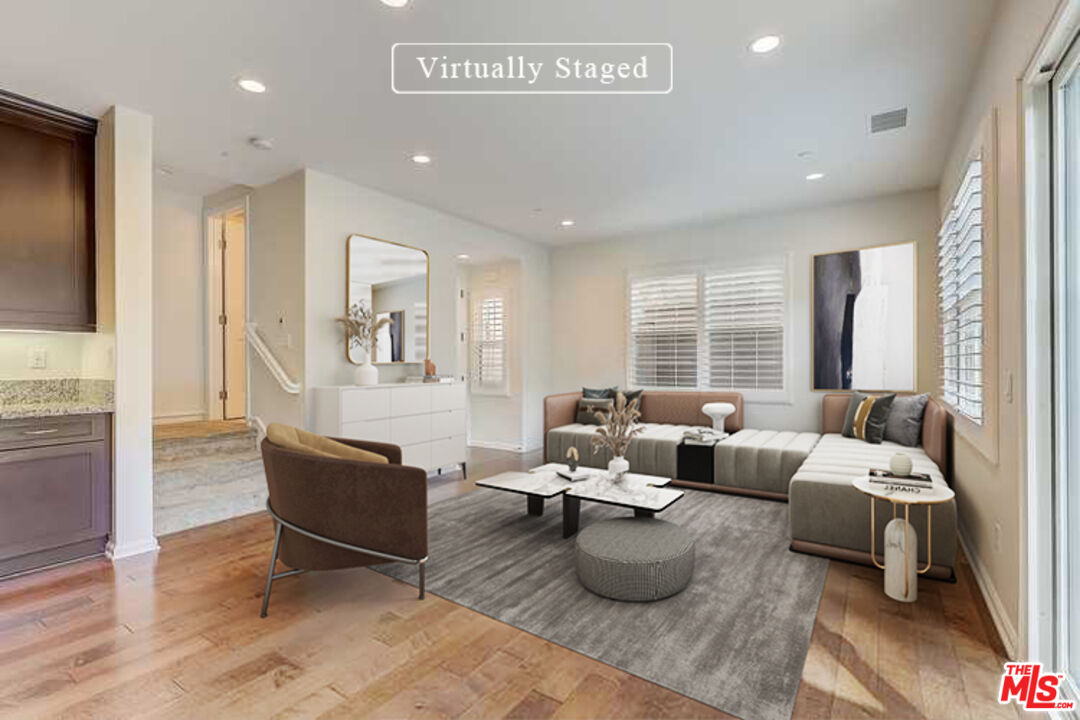 130 Firefly Irvine, CA 92618 - Photo 2 of 29 a living room with furniture and a large window