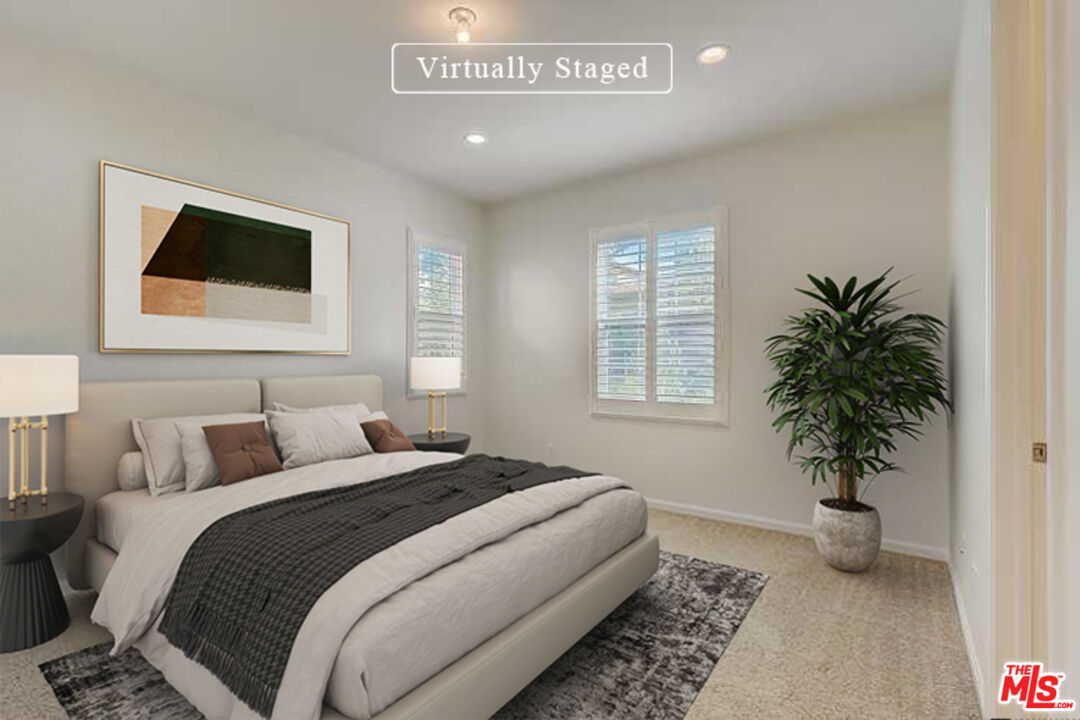 130 Firefly Irvine, CA 92618 - Photo 3 of 29 a bedroom with a bed and a potted plant