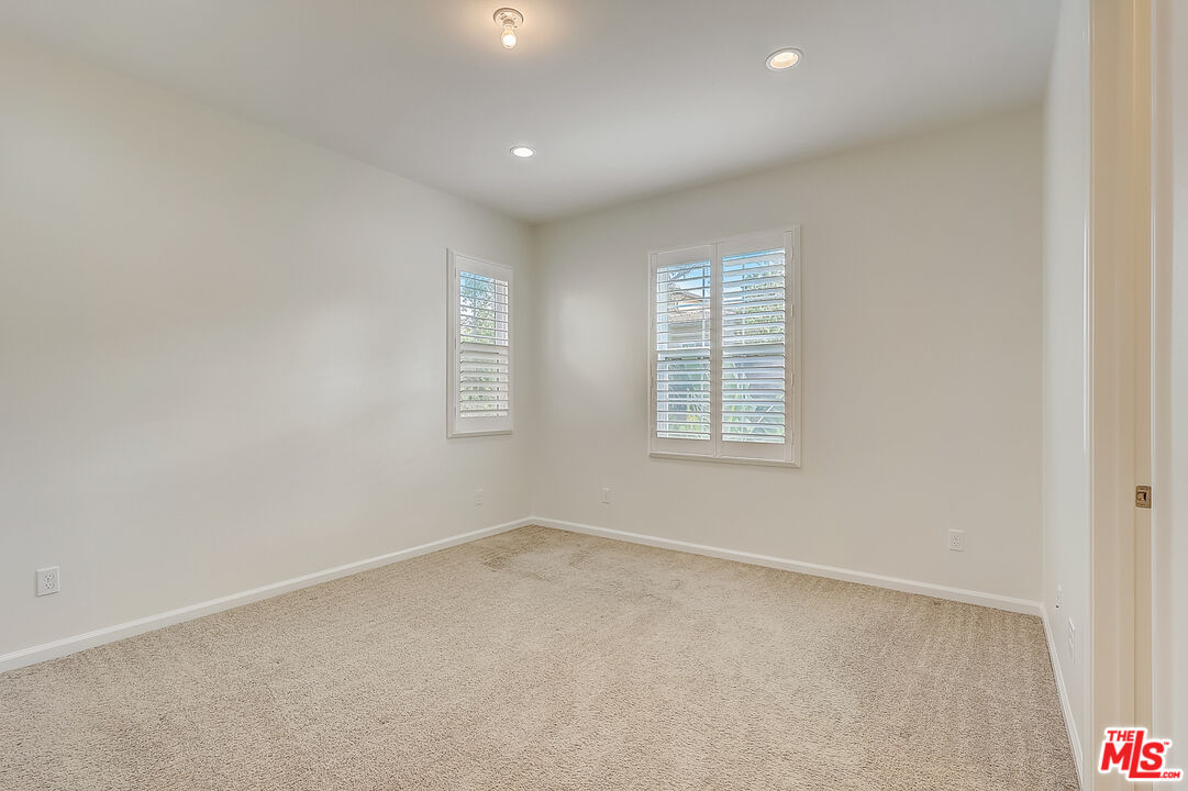 130 Firefly Irvine, CA 92618 - Photo 6 of 29 an empty room with windows