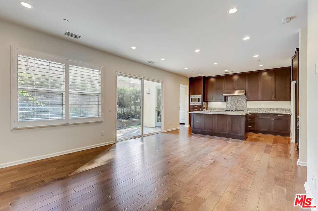 130 Firefly Irvine, CA 92618 - Photo 9 of 29 a view of kitchen with wooden floor