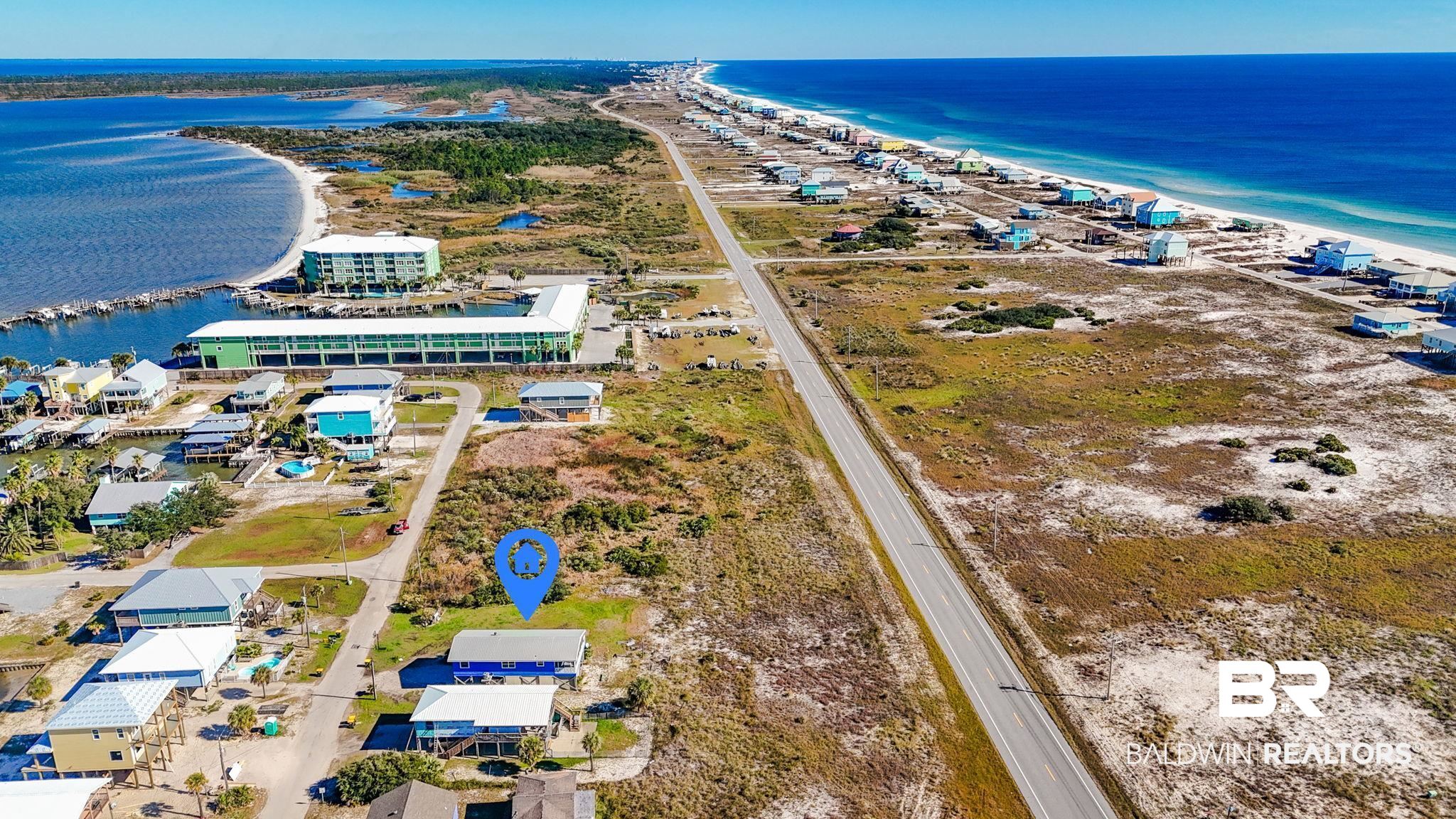 2514 Muscogee Road Gulf Shores, AL 36542 - Photo 6 of 60 Drone / aerial view featuring a water view and a beach view