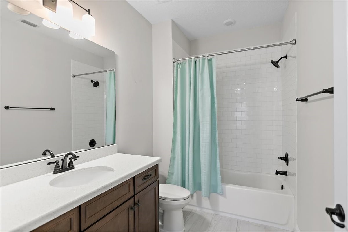 96014 Enclave Manor Fernandina Beach, FL 32034 - Photo 21 of 32 a bathroom with a sink toilet and shower