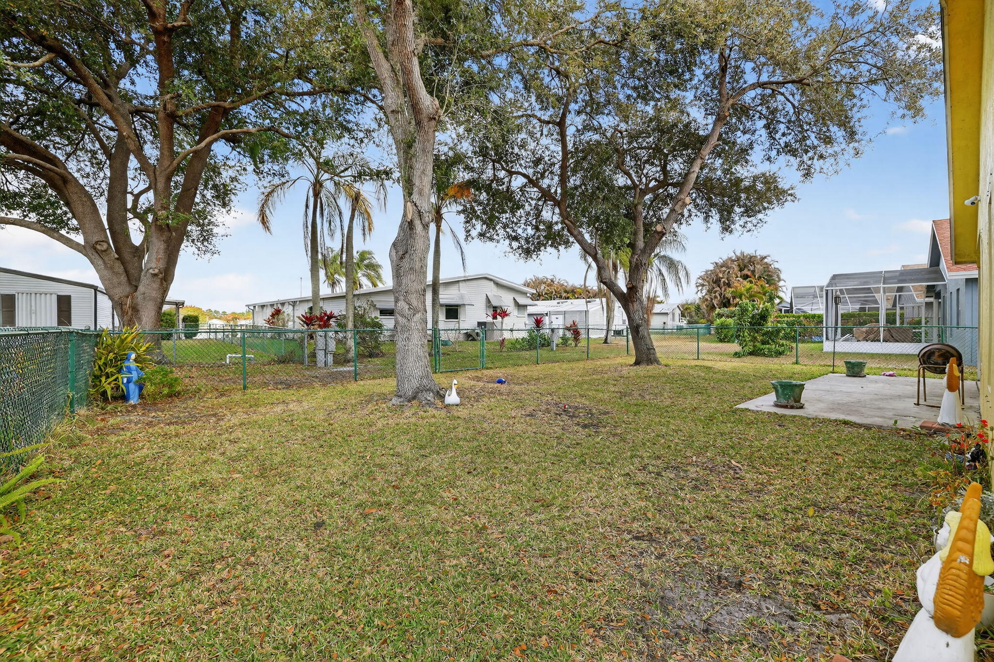 9042 Southwest Caprice Circle Stuart, FL 34997 - Photo 10 of 13 9042-22 Backyard 1