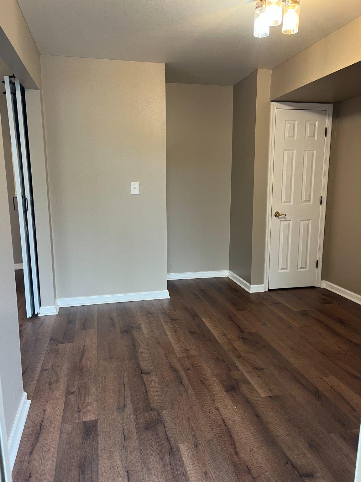 296 Canterbury Road, Unit 296J Bel Air, MD 21014 - Photo 10 of 13 Second bed room with warm wood floors.