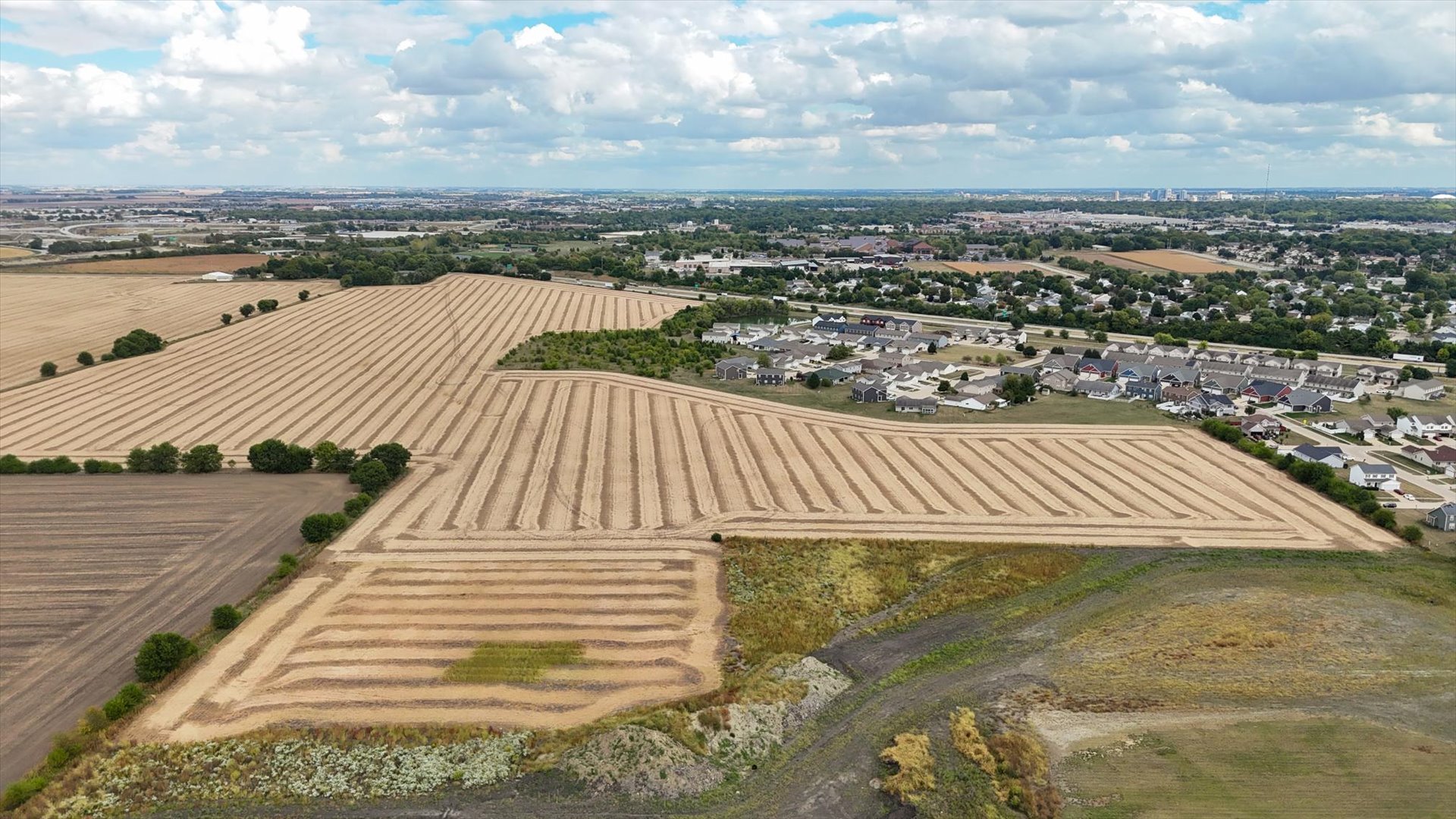 a view of a balcony with city