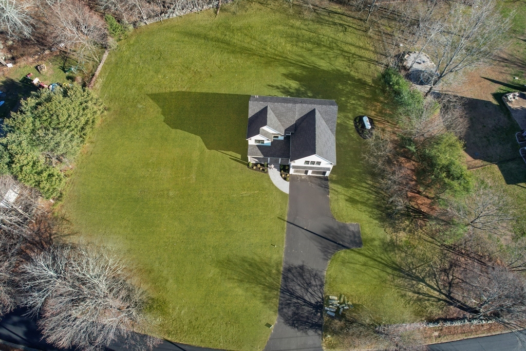 29 Thornton Street Mendon, MA 01756 - Photo 40 of 42 an aerial view of a house with a yard