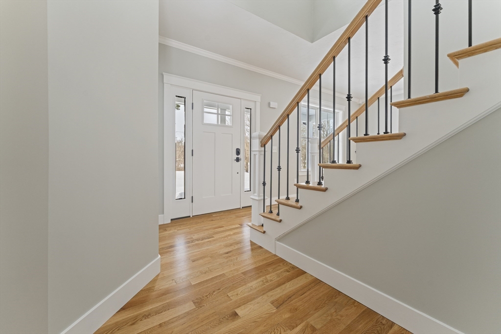 29 Thornton Street Mendon, MA 01756 - Photo 4 of 42 a view of staircase with wooden floor and white walls