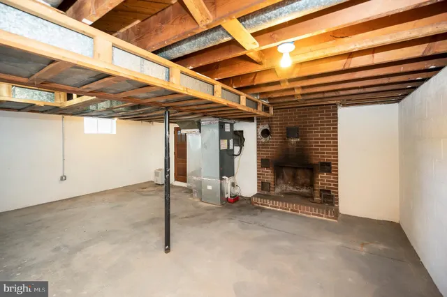 a view of a room with wooden walls