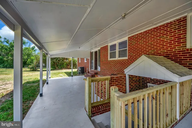 a view of swimming pool with seating space