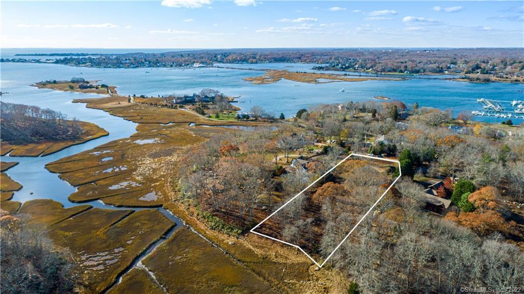 5 Heron Road Stonington, CT 06355 - Photo 1 of 1 Freshly Cleared Lot is ready for your design and build project to begin! 1.3 Acres with 100' of frontage on Heron Road. Municipal water to the site. Engineered septic required. Located in the Private Gated Masons Island Association in area of stately homes. Just a short distance to Historic Downtown Mystic, Stonington Borough, Train Station and Deep Water Marinas. Select your own Builder and Architect. Location, Location, Location!