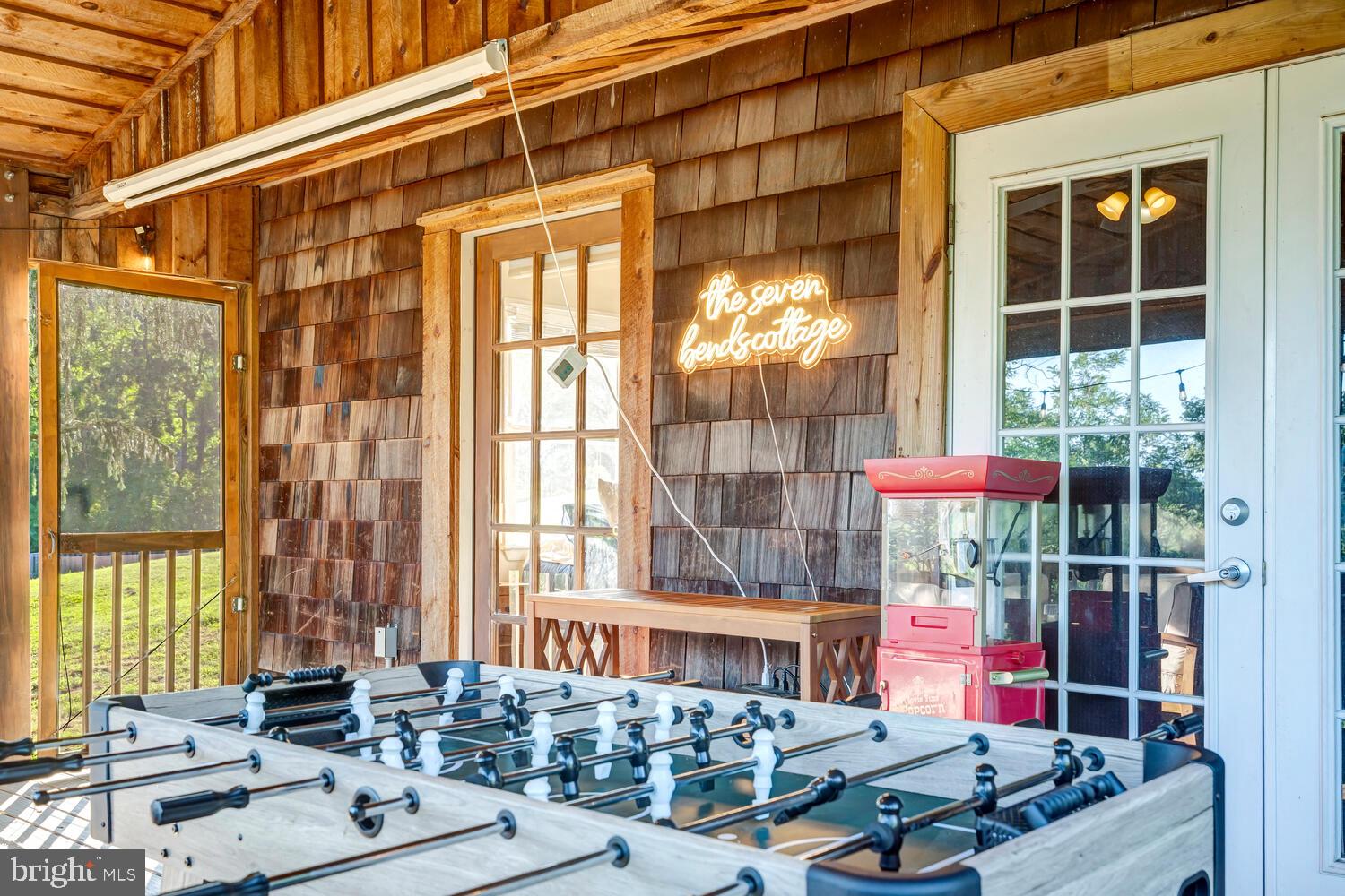 6235 South Page Valley Road Luray, VA 22835 - Photo 28 of 52 Charming game room with rustic flair.