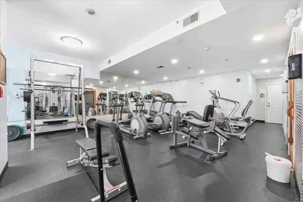 a view of a room with gym equipment
