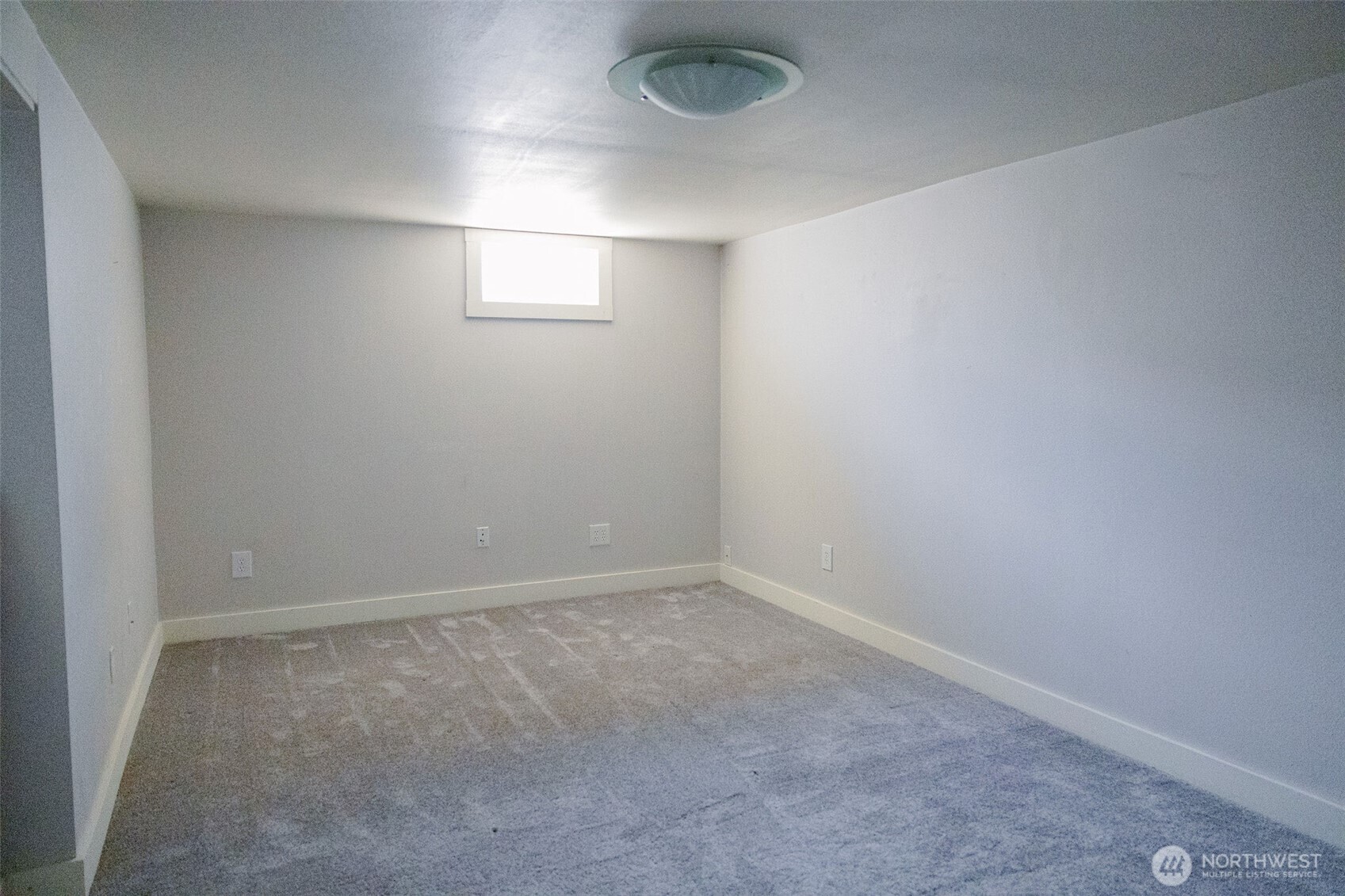 12 A Temby Road Tonasket, WA 98855 - Photo 24 of 36 an empty room with a empty space and window