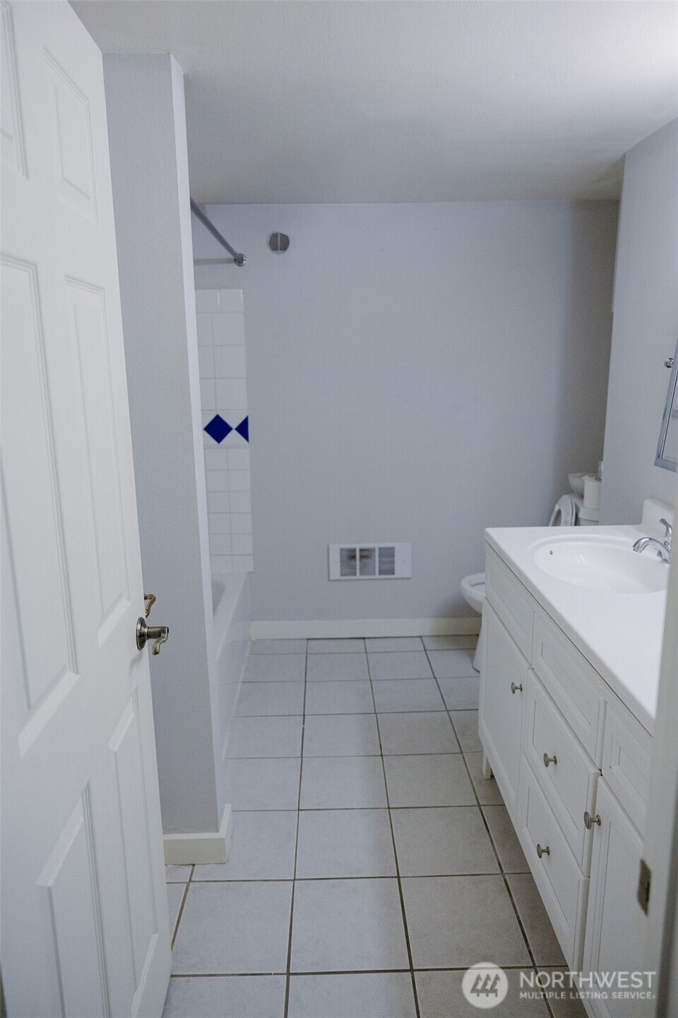 12 A Temby Road Tonasket, WA 98855 - Photo 26 of 36 a bathroom with a sink a toilet and shower