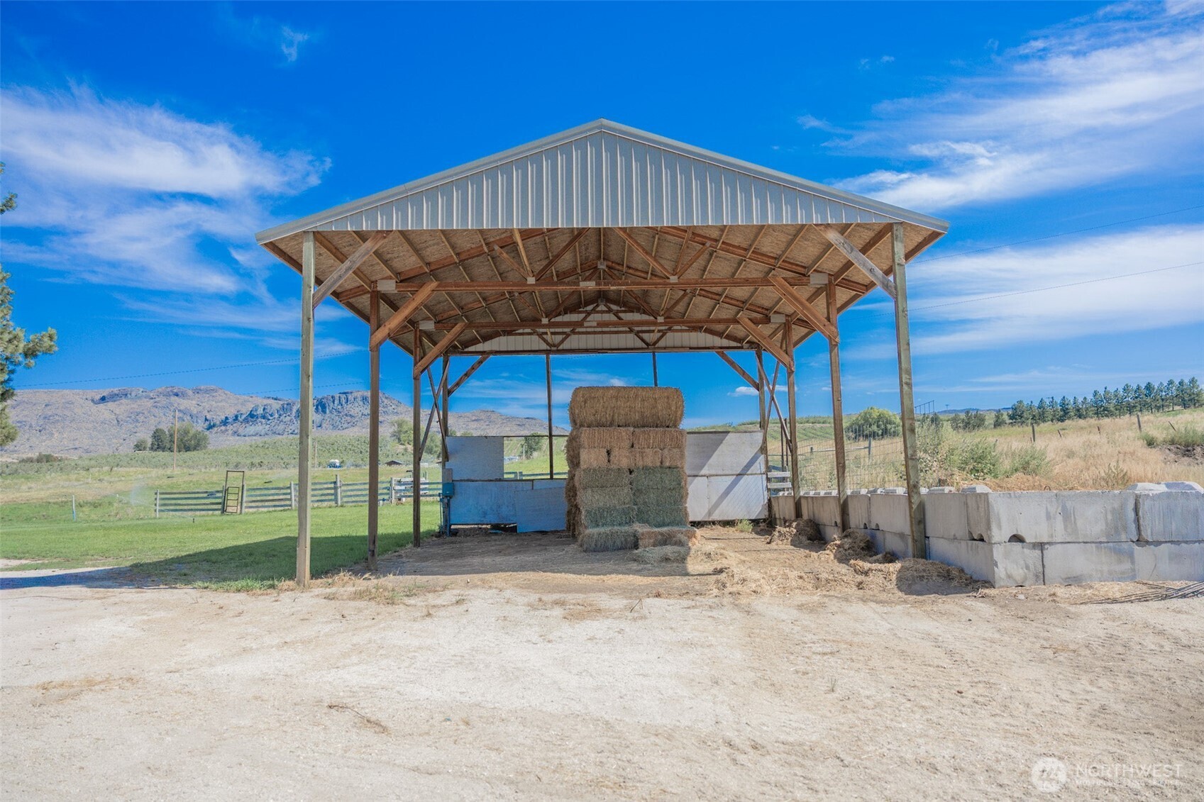12 A Temby Road Tonasket, WA 98855 - Photo 36 of 36 a view of a house with a yard porch and sitting area