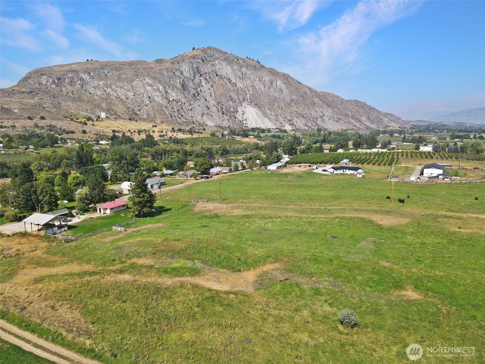 12 A Temby Road Tonasket, WA 98855 - Photo 4 of 36 a view of a town with mountains in the background