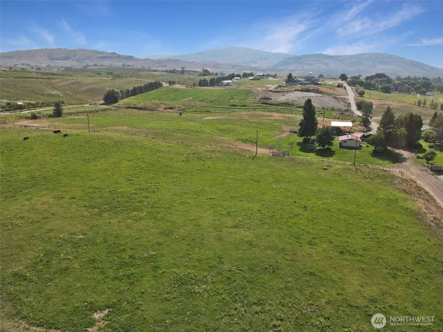a view of an ocean and a mountain