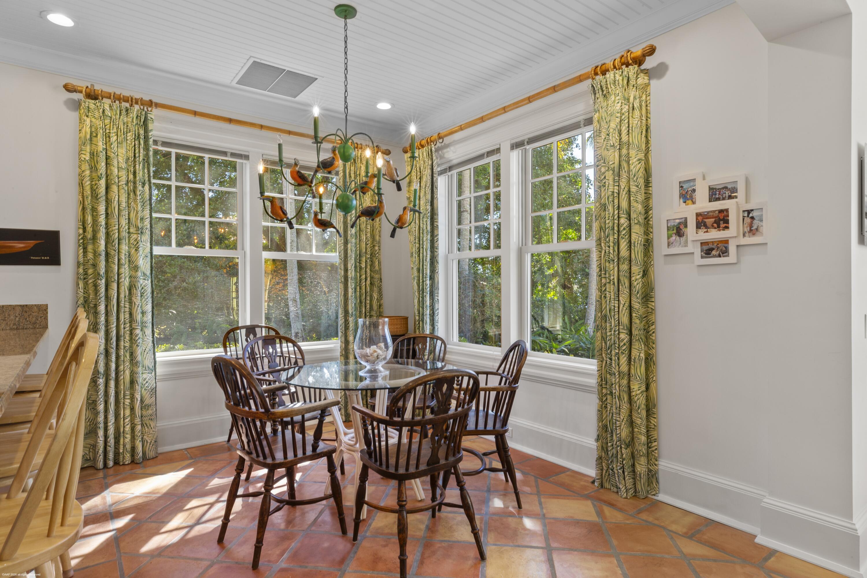 228 South Beach Road Jupiter Island, FL 33455 - Photo 15 of 40 a view of a dining room with furniture window and outside view